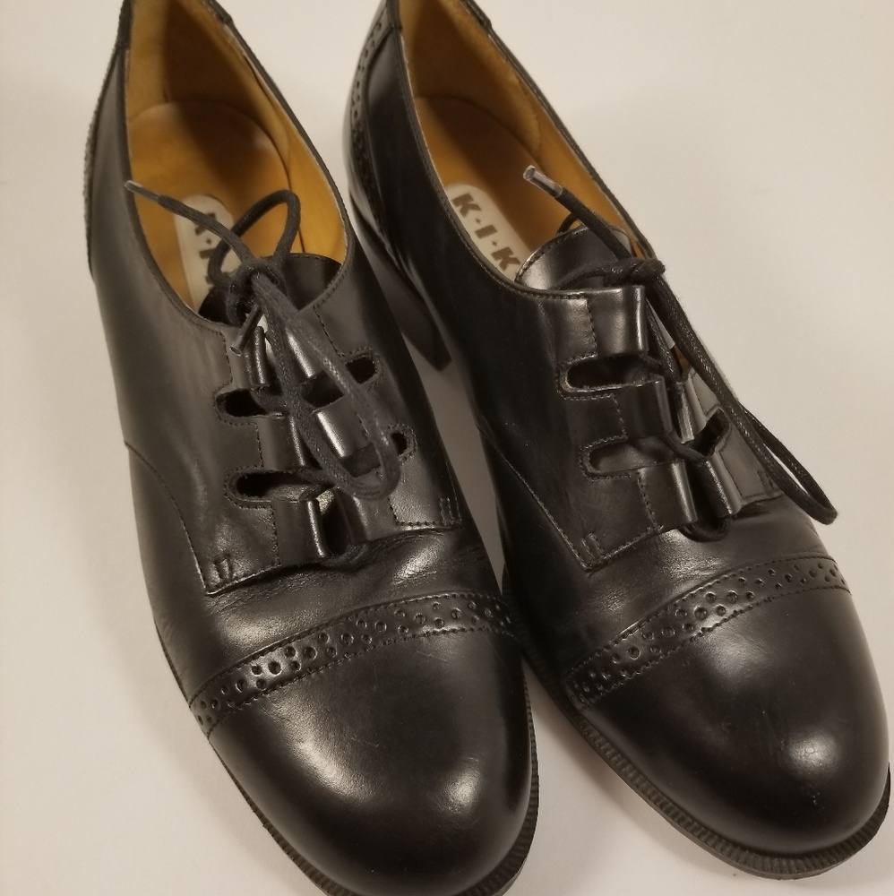 Black wingtip oxfords by KIKIT size 7.5 M